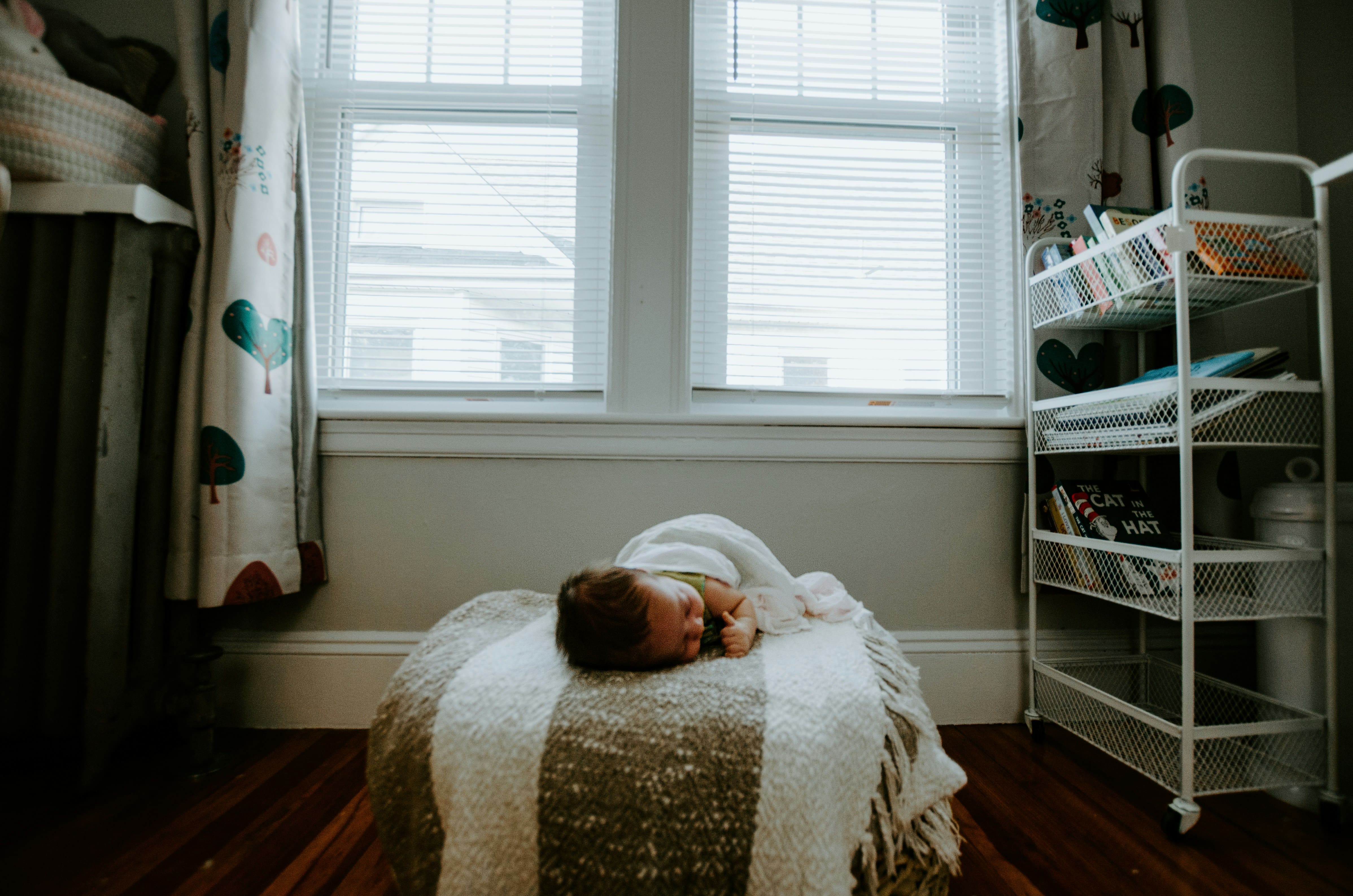 Baby essentials and natural fabric items laid out neatly